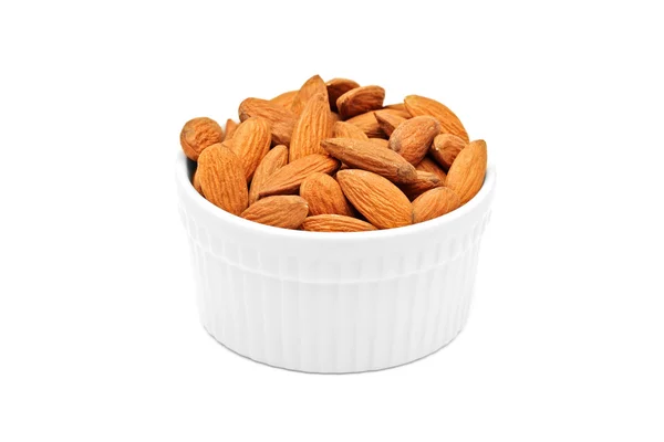 Almonds in porcelain bowl — Stock Photo, Image