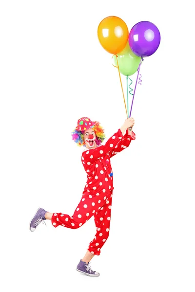 Manliga clown innehav ballonger — Stockfoto