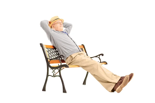 Mature man sitting on bench — Stock Photo, Image