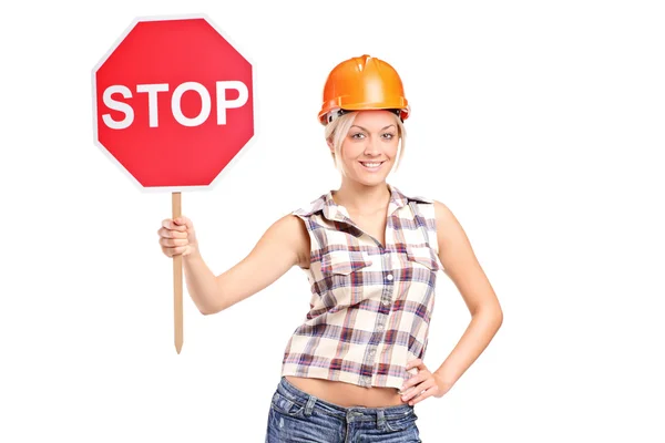 Robotnik budowlany gospodarstwo Kupczenie znak stop — Zdjęcie stockowe
