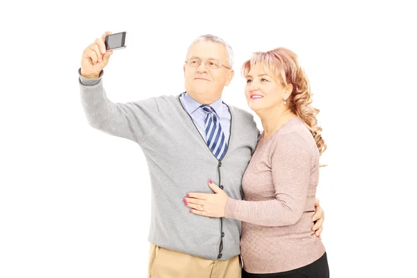 Man and woman taking pictures of themselves — Stock Photo, Image