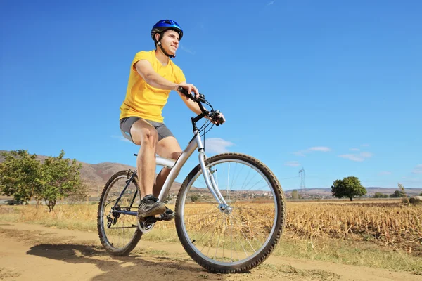 Male riding bike — Stock Photo, Image