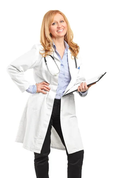 Female doctor holding clipboard — Stock Photo, Image