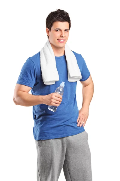 Hombre con botella de agua después de hacer ejercicio —  Fotos de Stock