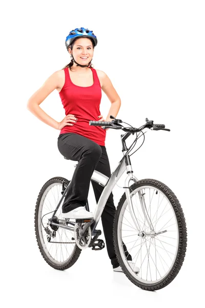 Female bicyclist giving thumb up — Stock Photo, Image