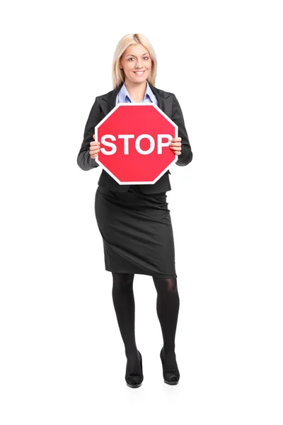 Businesswoman holding sign stop — Stock Photo, Image