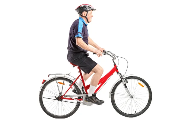 Seniorradler fährt Fahrrad — Stockfoto