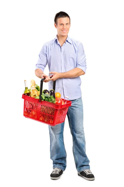 Male holding shopping basket — Stock Photo, Image