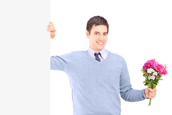 Male holding flowers — Stock Photo, Image