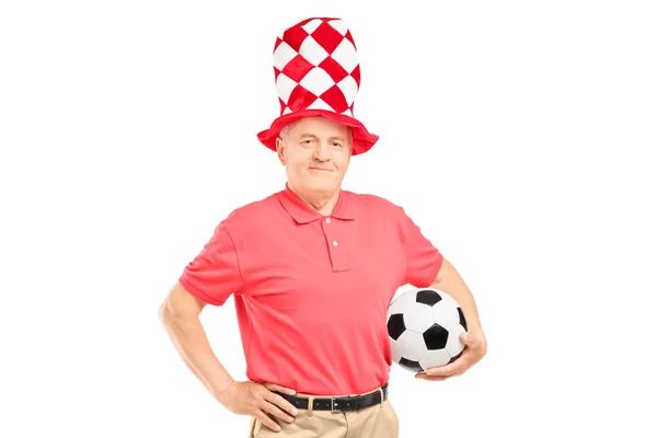 Männlicher Fan hält Fußball in der Hand — Stockfoto