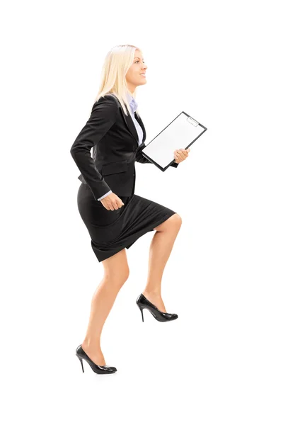 Businesswoman doing huge step — Stock Photo, Image