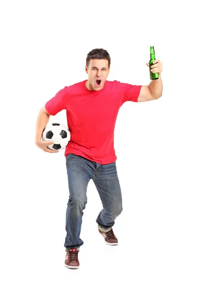 Euphoric fan holding beer bottle — Stock Photo, Image