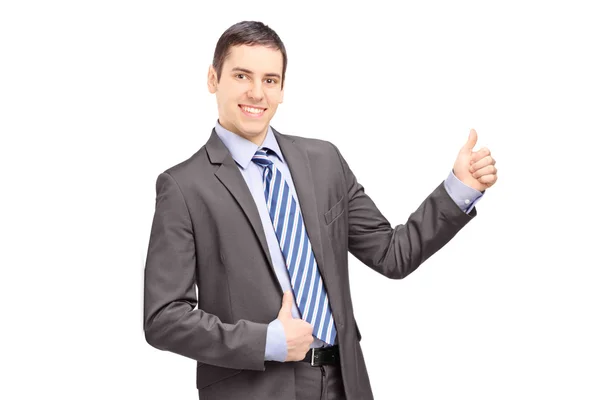 Businessman giving thumb up — Stock Photo, Image