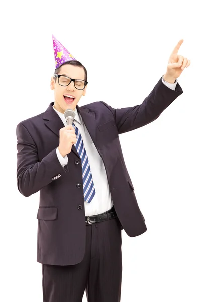 Businessman singing on microphone — Stock Photo, Image
