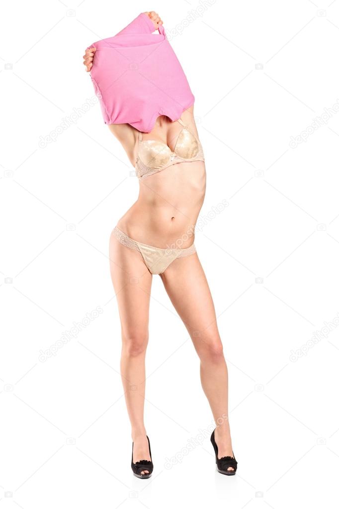 Woman takes off her clothes Stock Photo by ©ljsphotography 45854301