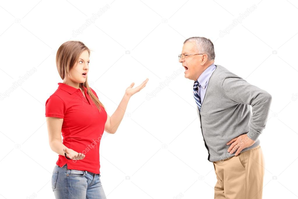 Angry mature man shouting at female