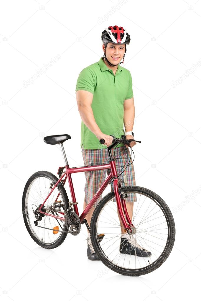 Man posing with mountain bike