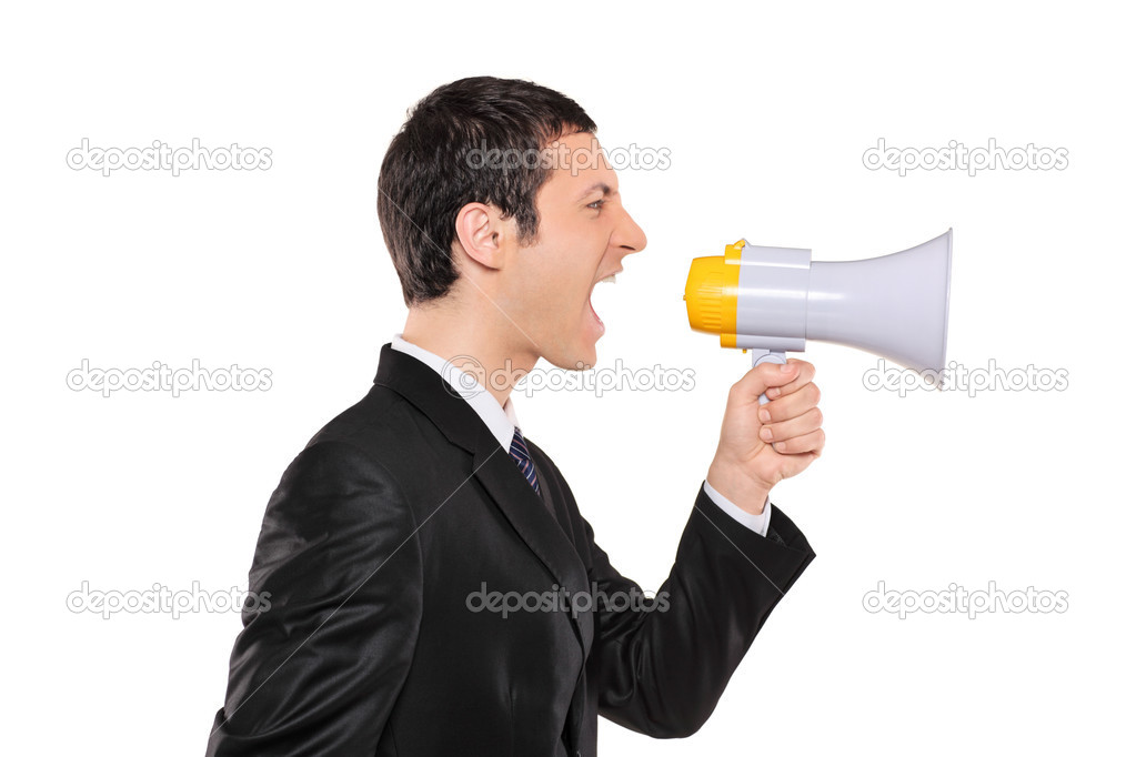 Businessman shouting via megaphone