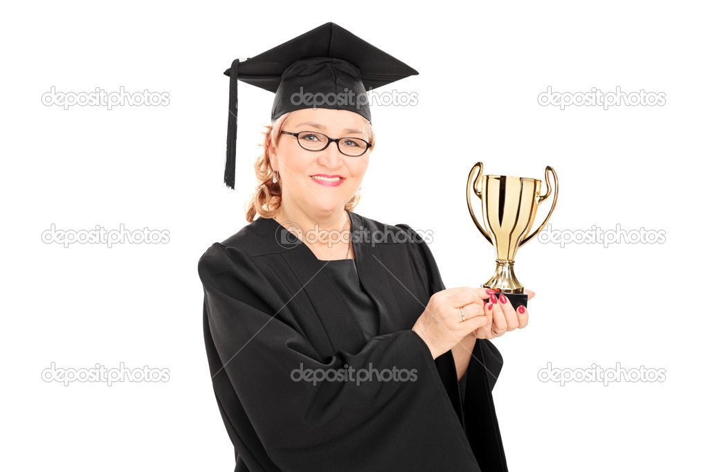 Female student holding gold cup