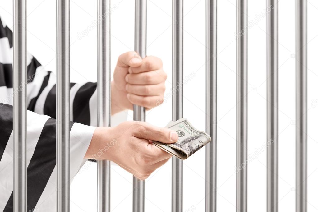 Man in jail giving bribe