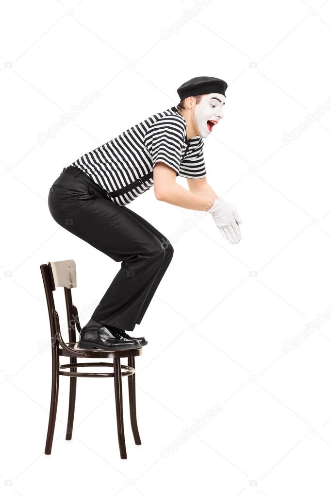 Comedian jumping from chair