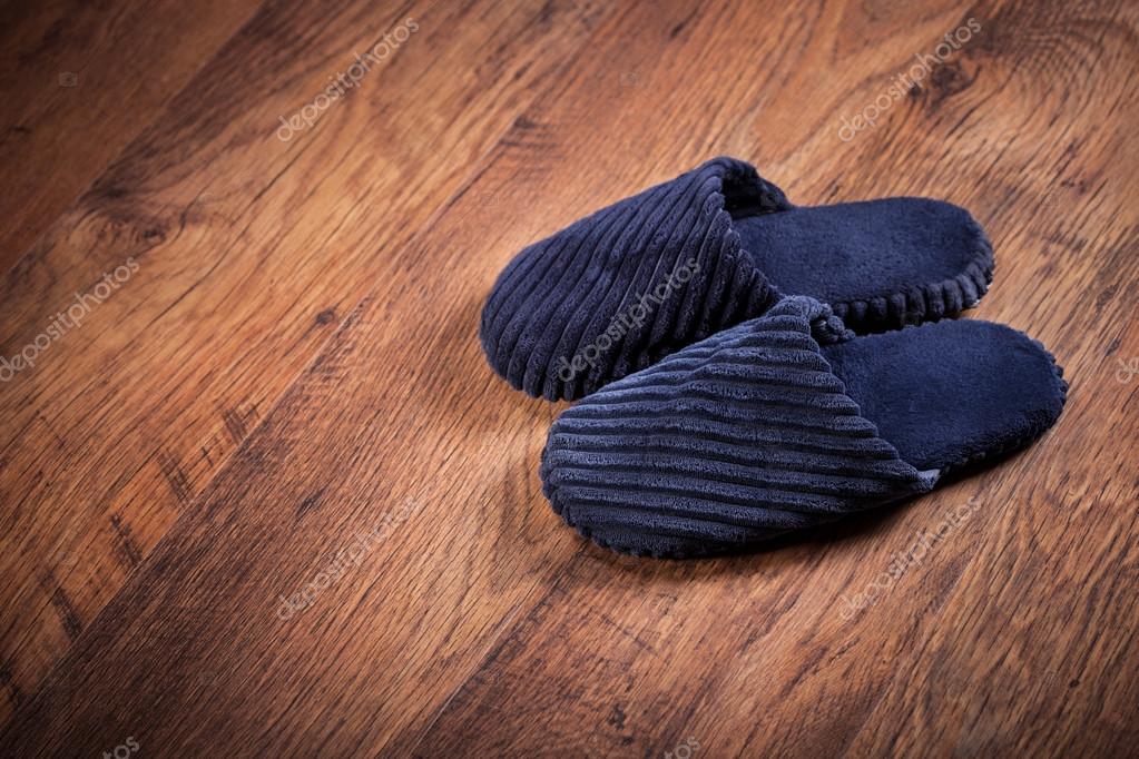 Pair of slippers on the floor — Stock Photo © ljsphotography 45858667
