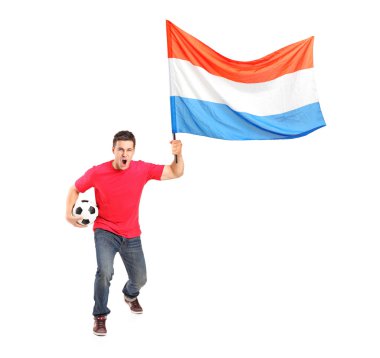 Futbol ve Hollanda bayrağı tutarak fan