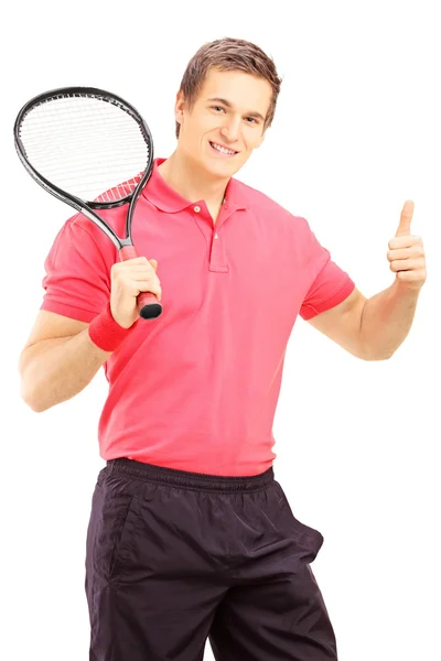 Mann hält Tennisschläger in die Höhe — Stockfoto