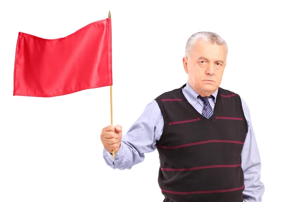 Trauriger Mann schwenkt rote Fahne — Stockfoto