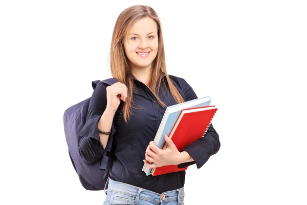 Studentin hält Notizbücher in der Hand — Stockfoto