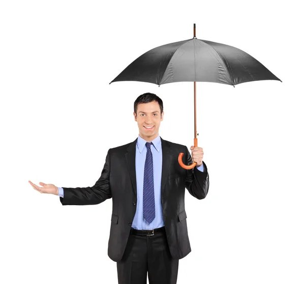 Man holding umbrella — Stock Photo, Image
