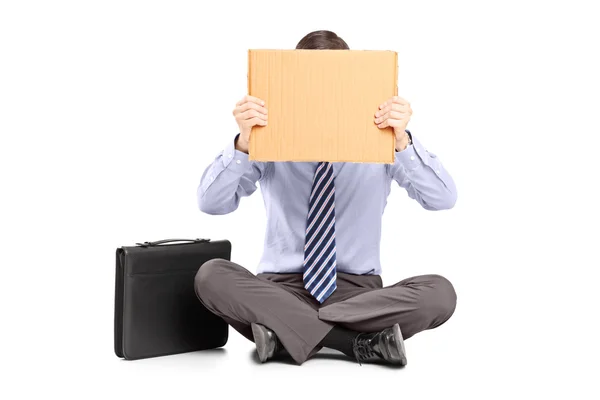 Businessman hiding his face — Stock Photo, Image