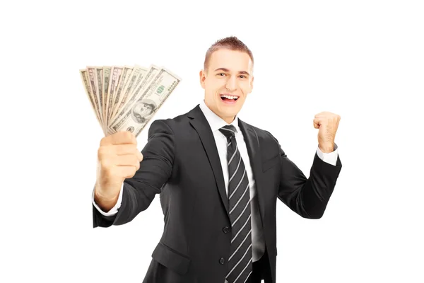 Man holding dollars — Stock Photo, Image