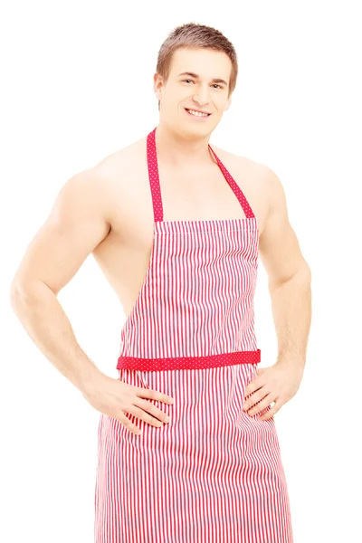 Handsome man wearing a red apron — Stock Photo, Image