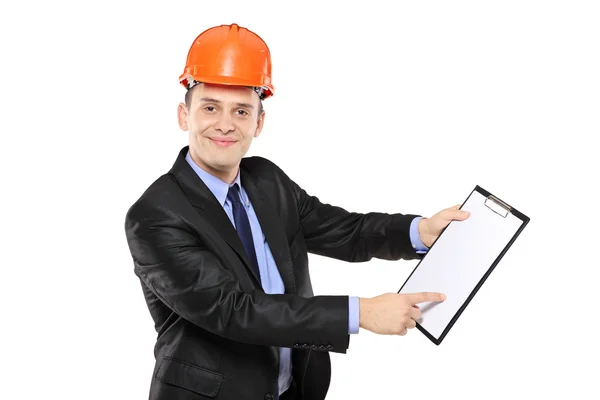 Foreman pointing on clipboard — Stock Photo, Image