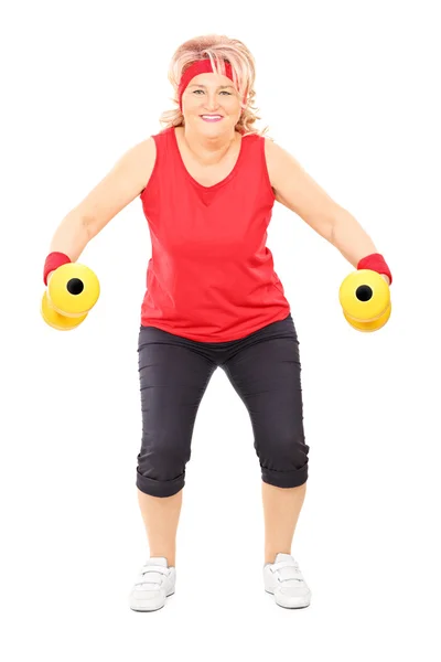 Mulher exercitando com dumbbe — Fotografia de Stock