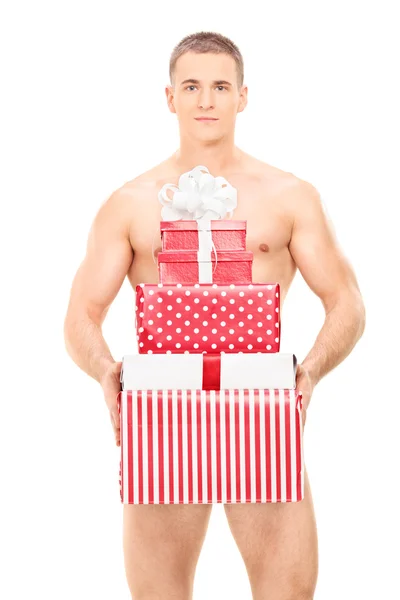 Hombre desnudo sosteniendo regalos — Foto de Stock