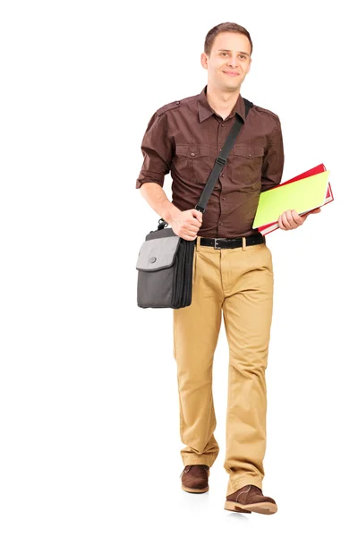 Man lopen met boeken — Stockfoto