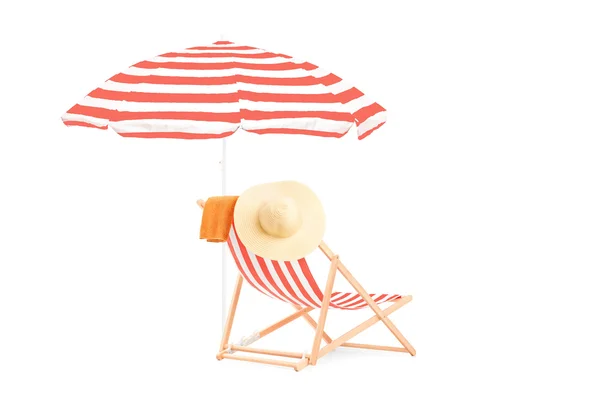 Sun lounger and umbrella — Stock Photo, Image