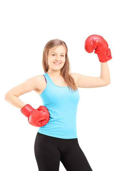 Female athlete wearing boxing gloves