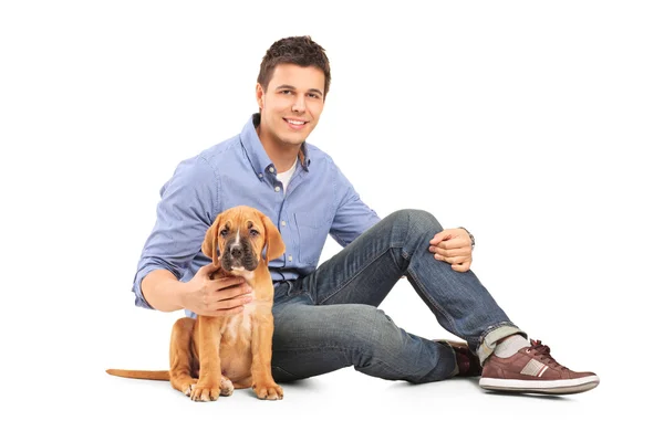 Homem com cachorro de cana-de-corso — Fotografia de Stock