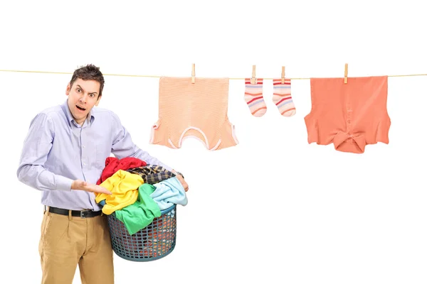 Man holding laundry basket — Stock Photo, Image