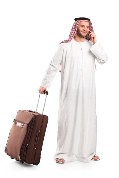 Арабский турист с чемоданом — стоковое фото