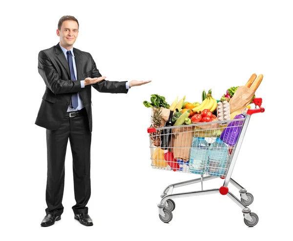 Man and shopping cart — Stock Photo, Image