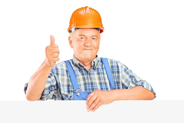 Mature worker with helmet — Stock Photo, Image