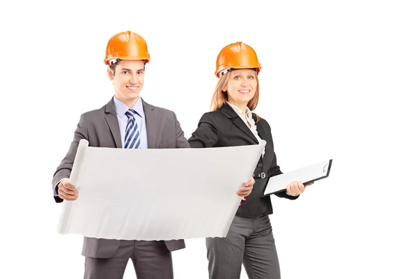 Male and female engineers posing — Stock Photo, Image