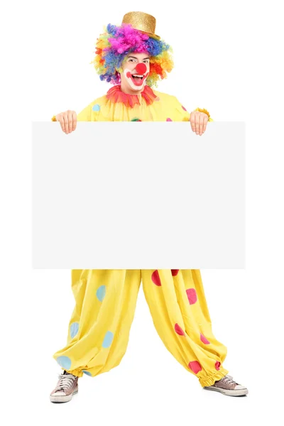Manliga clown innehav tom panel — Stockfoto