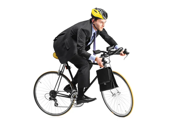 Businessman riding bicycle — Stock Photo, Image