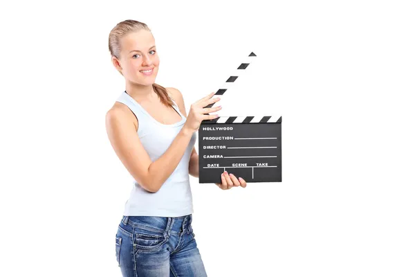 Chica sosteniendo película clap — Foto de Stock