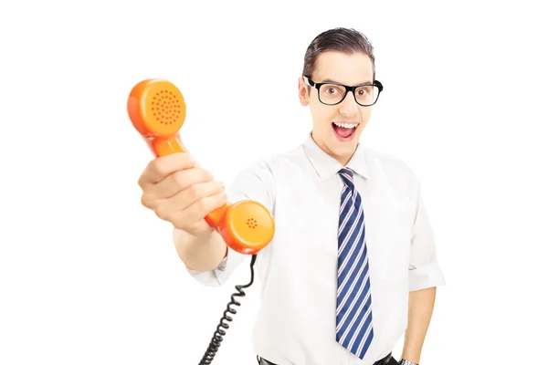 Hombre dando un tubo telefónico — Foto de Stock